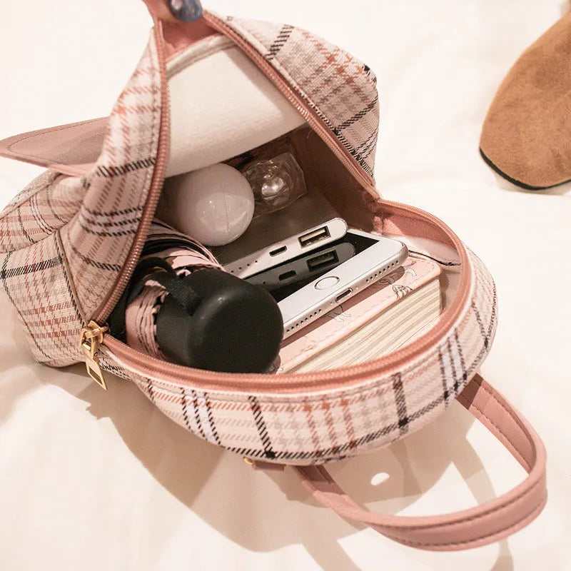 Diagonal one shoulder phone bag in PU leather available in five colours.