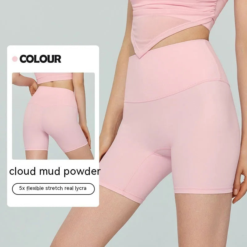 Women's high waist leaf green Lycra yoga shorts for fitness and cycling.