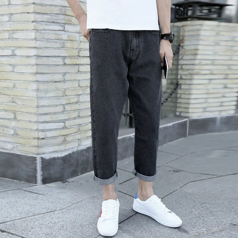 Men's loose straight leg harem style jeans in black or blue cotton fabric