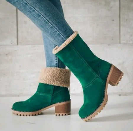 Women's mid-tube suede snow boot in black with a thick heel and round toe.