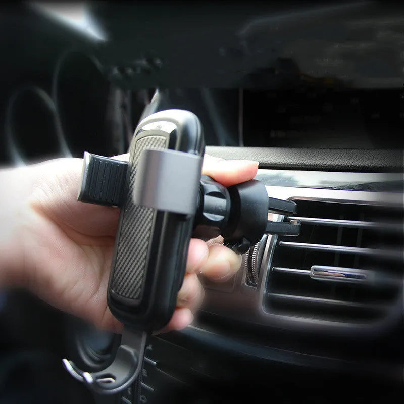 Black car wireless charger made from PVC and magnesium aluminium alloy on a car dashboard
