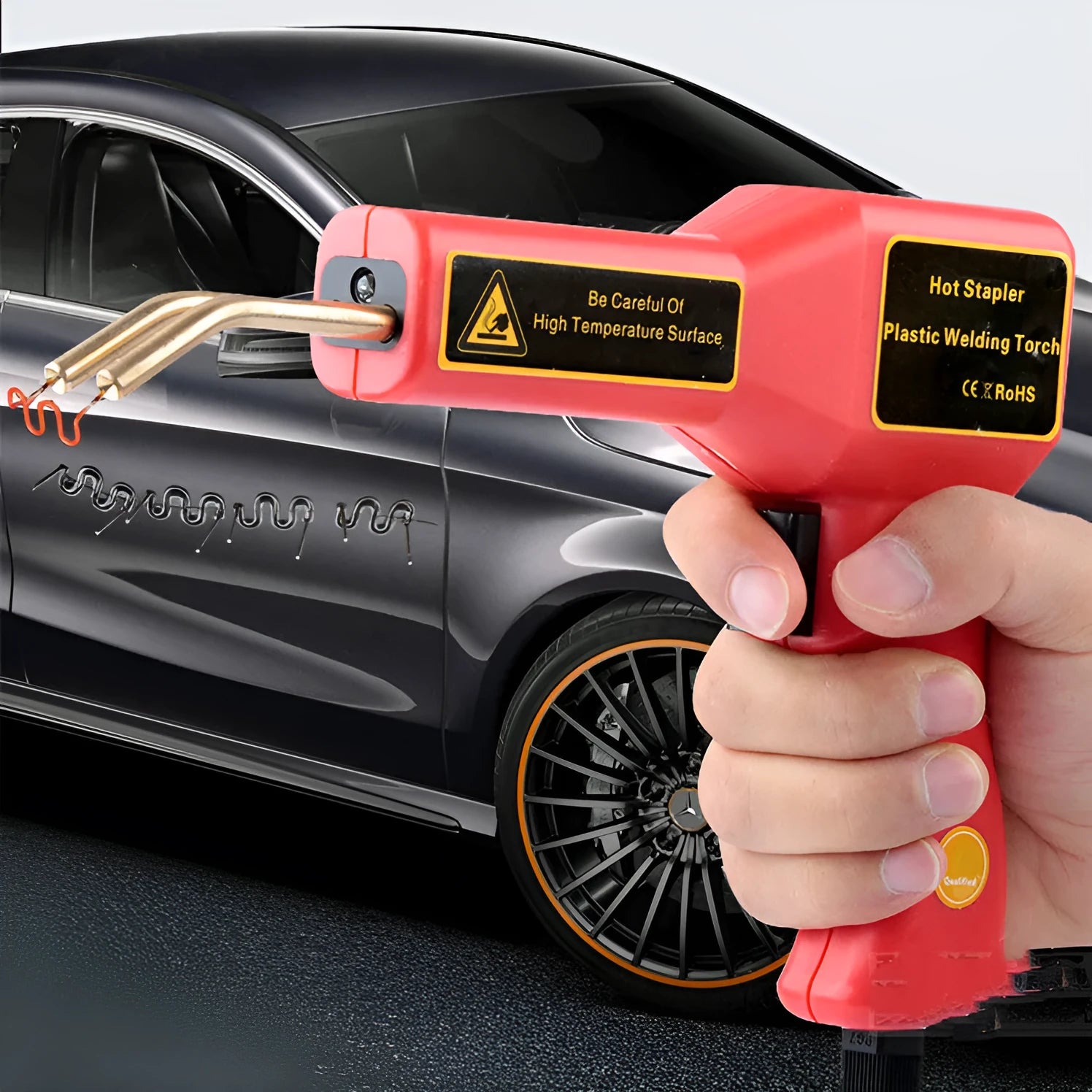 Plastic repair welding gun with LED light for car bumper repairs showing power cord and welding nails