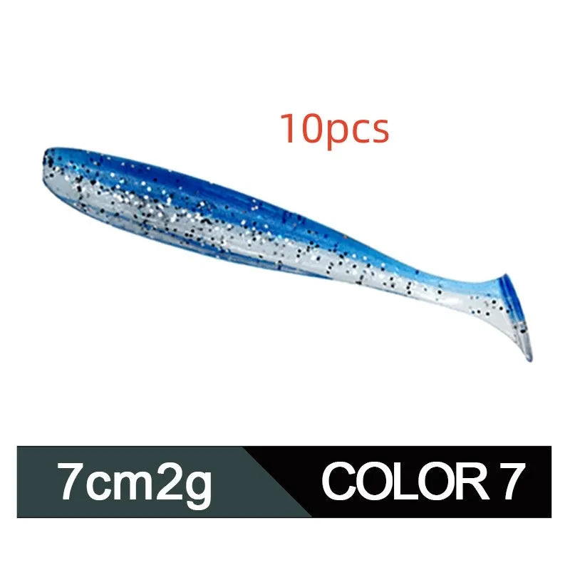 Soft plastic T-tail fishing lure in two-tone mandarin fish pattern, 7cm long.