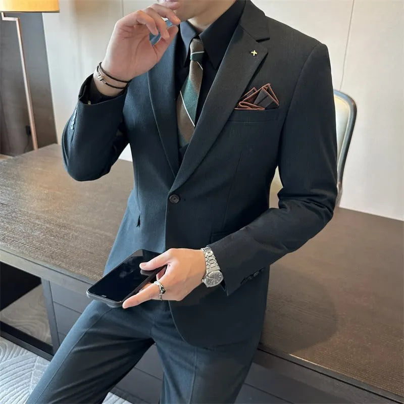 Men's dark green slim fit business suit with structured blazer and trousers