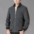Men's grey sports-style fleece jacket with long sleeves and side pockets on a hanger.