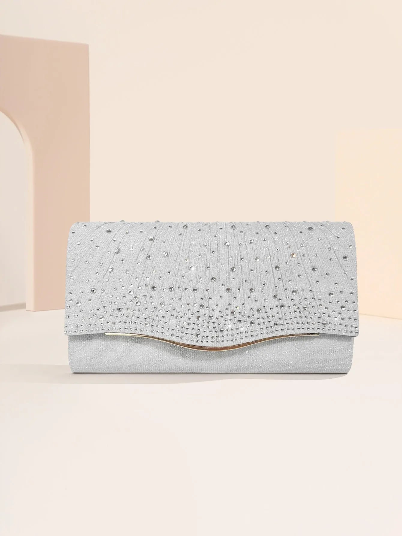 Women's dinner clutch bag in woven fabric with rhinestone dress garment design, available in black, champagne, and silver