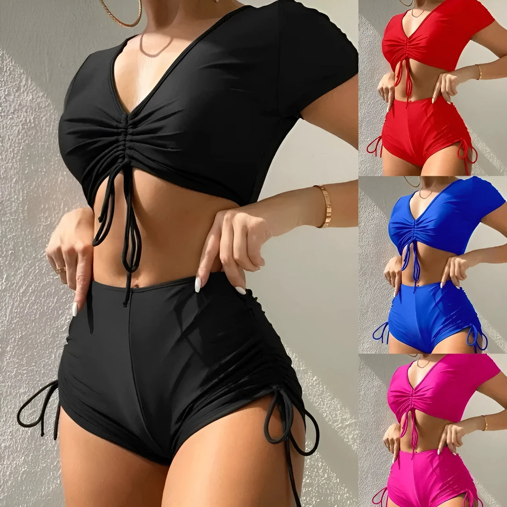 Women's dark green lace-up front swimsuit top with matching shorts on a mannequin
