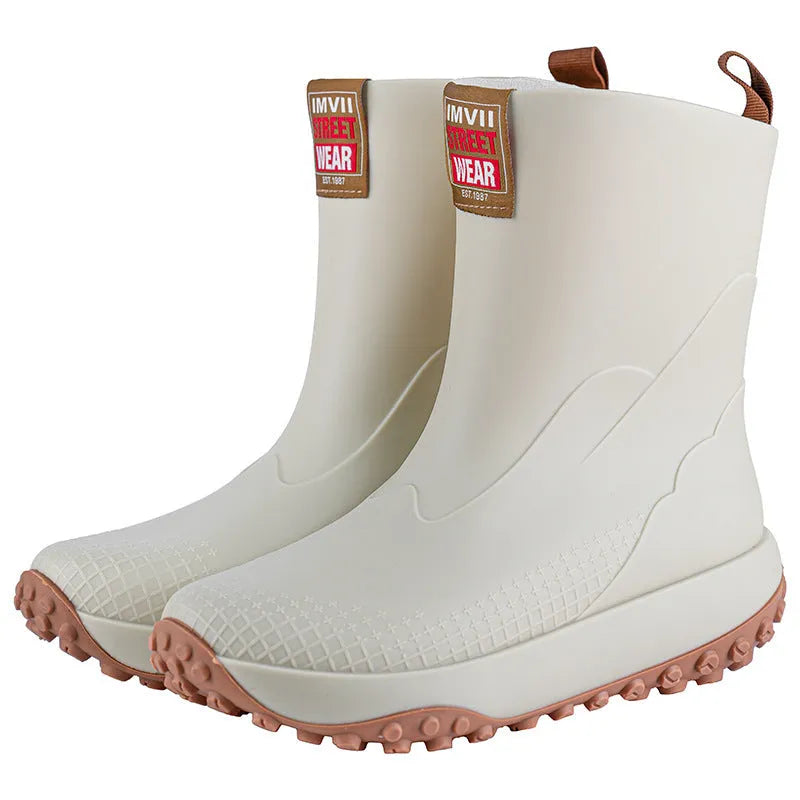 Men's mid and low tube rain boots in black, waterproof PVC with non-slip plastic sole on wet ground