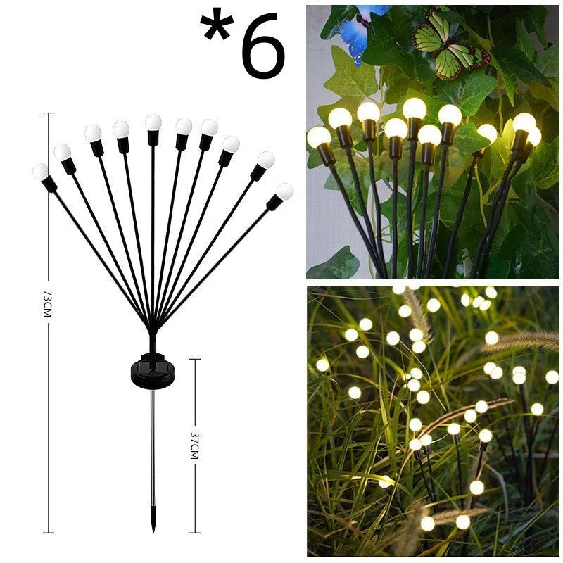 Solar-powered LED garden ground light with multiple light heads and a stainless steel spike for installation.