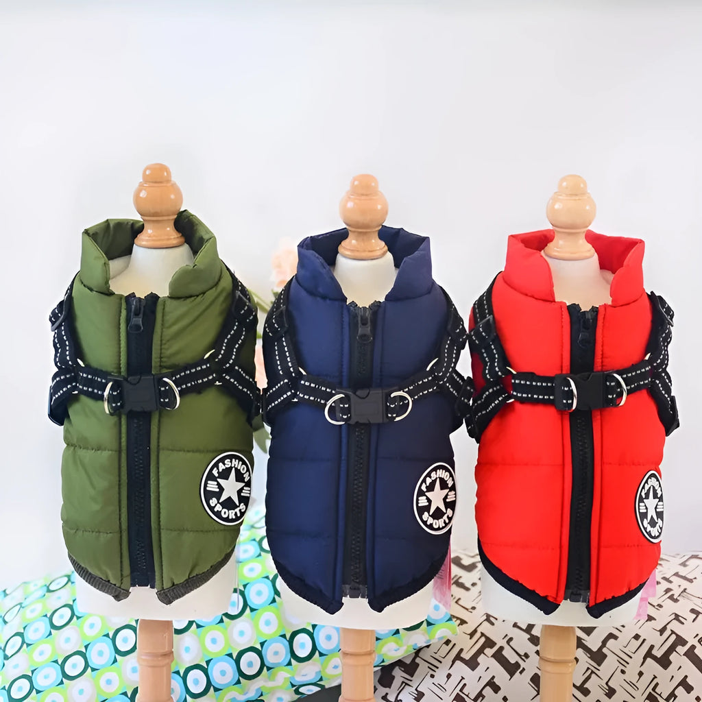 Waterproof dog coat with integrated harness in red, shown on a dog