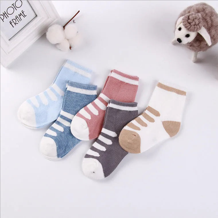 Set of five children's cotton socks in assorted solid colours and stripes, mid-tube length for toddlers 1-3 years