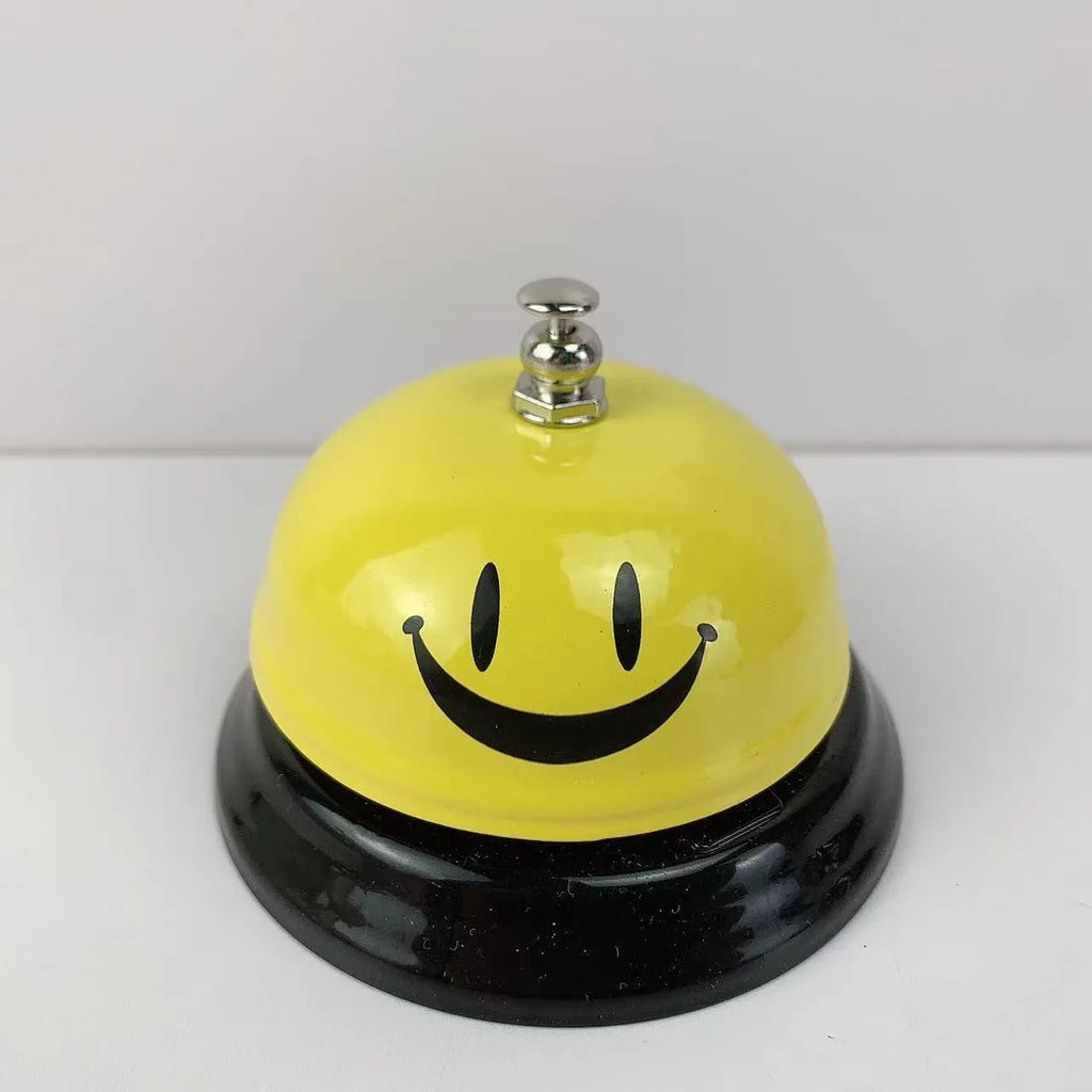 A multi-colour iron hand bell for games, classrooms, or restaurant service.