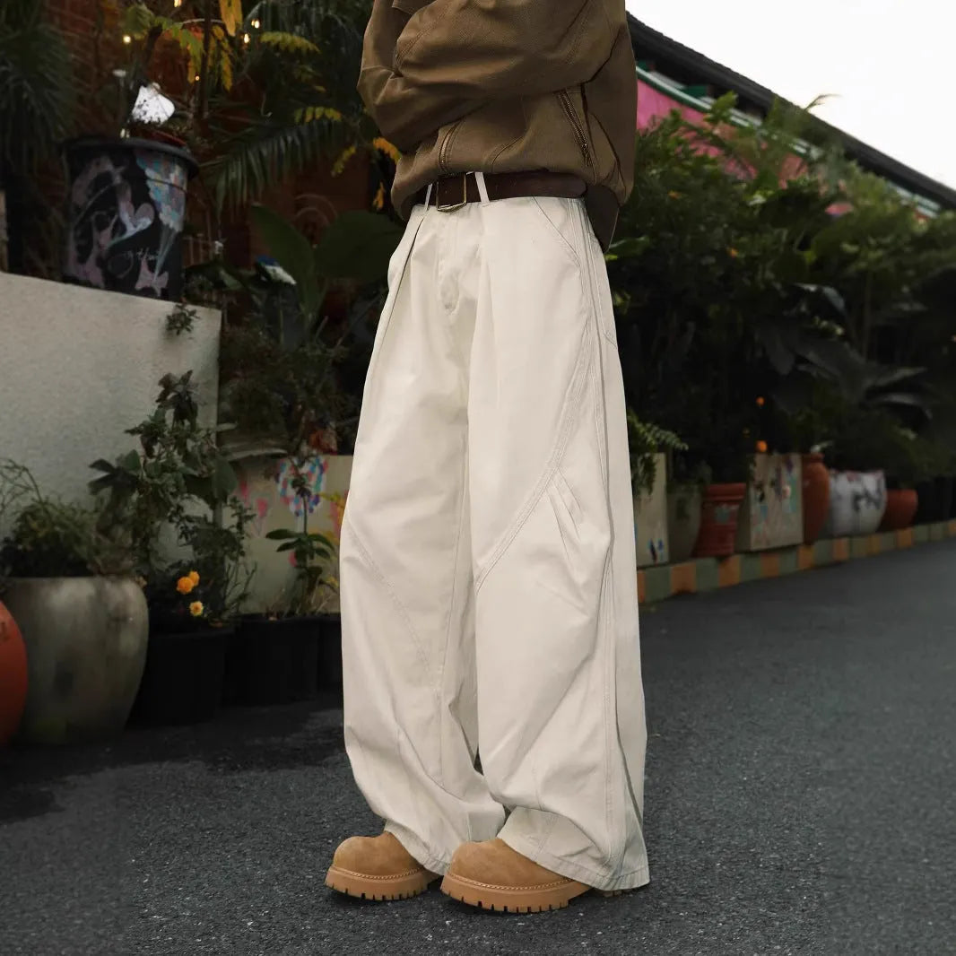 Men's pleated straight trousers in apricot colour with elastic waistband and loose fit