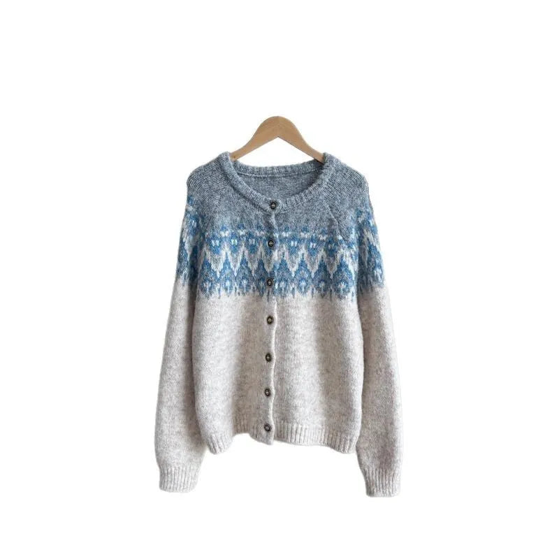 Women's beige jacquard knit sweater coat with contrast pattern, shown with long sleeves and a loose fit.
