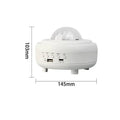White Bluetooth galaxy star projector night lamp showing starry sky projection on a wall.