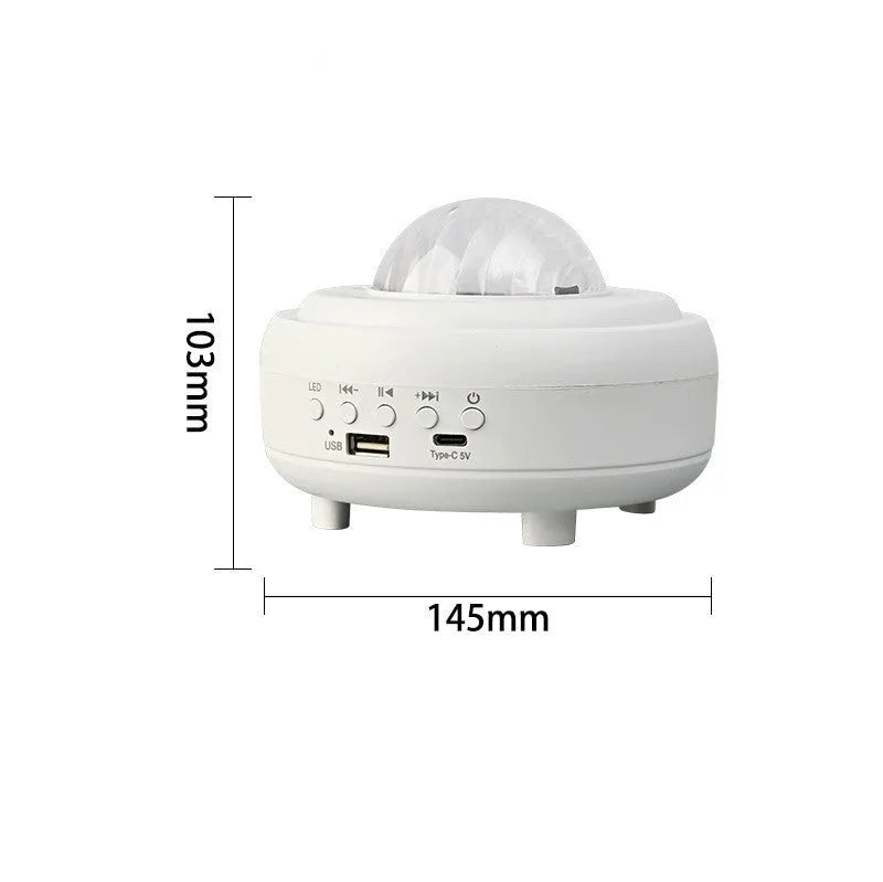 White Bluetooth galaxy star projector night lamp showing starry sky projection on a wall.