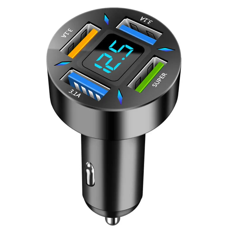 Black four-port USB car charger with digital LED display, shown plugged into a car dashboard.