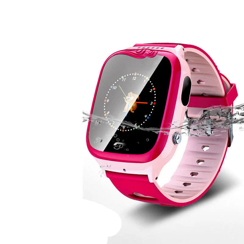 Blue children's smartwatch phone with touchscreen showing time, on a silicone wristband.