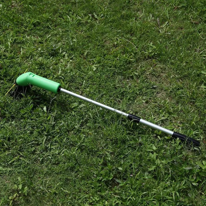 Cordless lawn trimmer with extension pole and protective shield on a garden background
