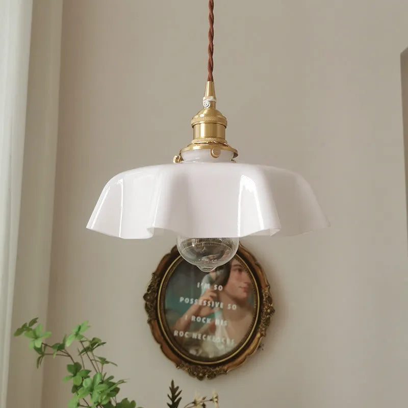 Medieval brass flower bud French chandelier with glass lamp body and adjustable height