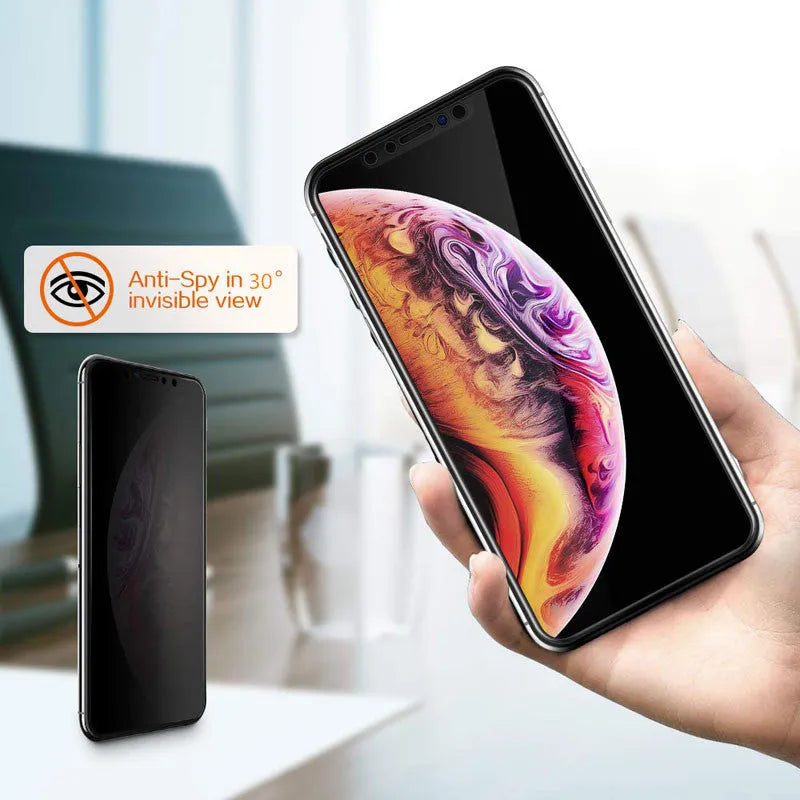 Black tempered glass privacy screen protector for Apple iPhone on a table