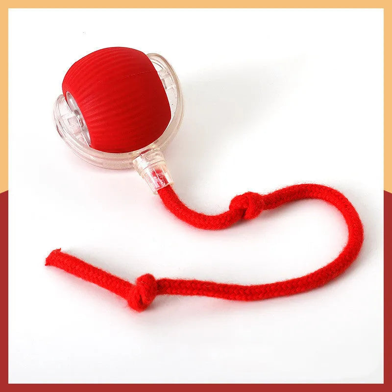 Flexible silicone rolling ball cat toy in plush red, green, and grey colours