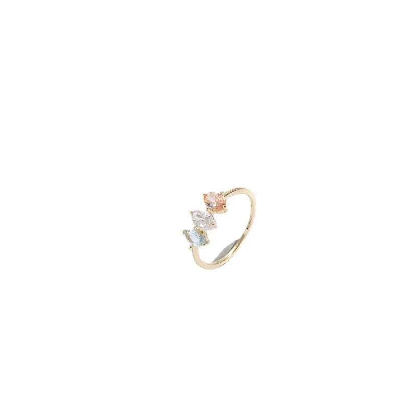 Geometric triangle ring with tricolour zircon stones in horse eye pattern and gold colour finish