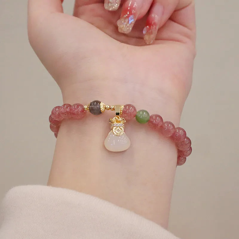 Strawberry quartz women's bracelet with geometric design, peace buckle charm and safety buckle closure