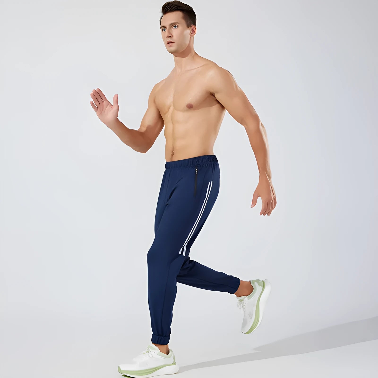 Men's black running trousers with mid-waist design and full-length cut for exercise activities
