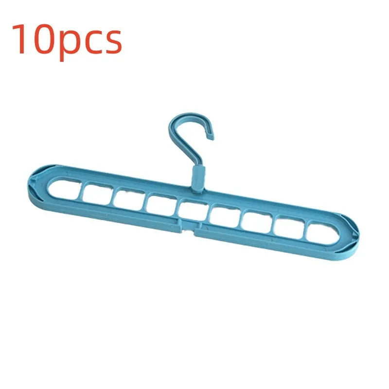 Plastic nine-hole folding pant hanger in multiple colours for dormitory wardrobe organisation