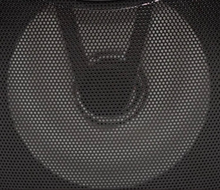 Portable Bluetooth speaker with plastic housing in black, blue, or pink colour options