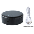 Black solar-powered car air humidifier mounted on a vehicle air conditioning vent.