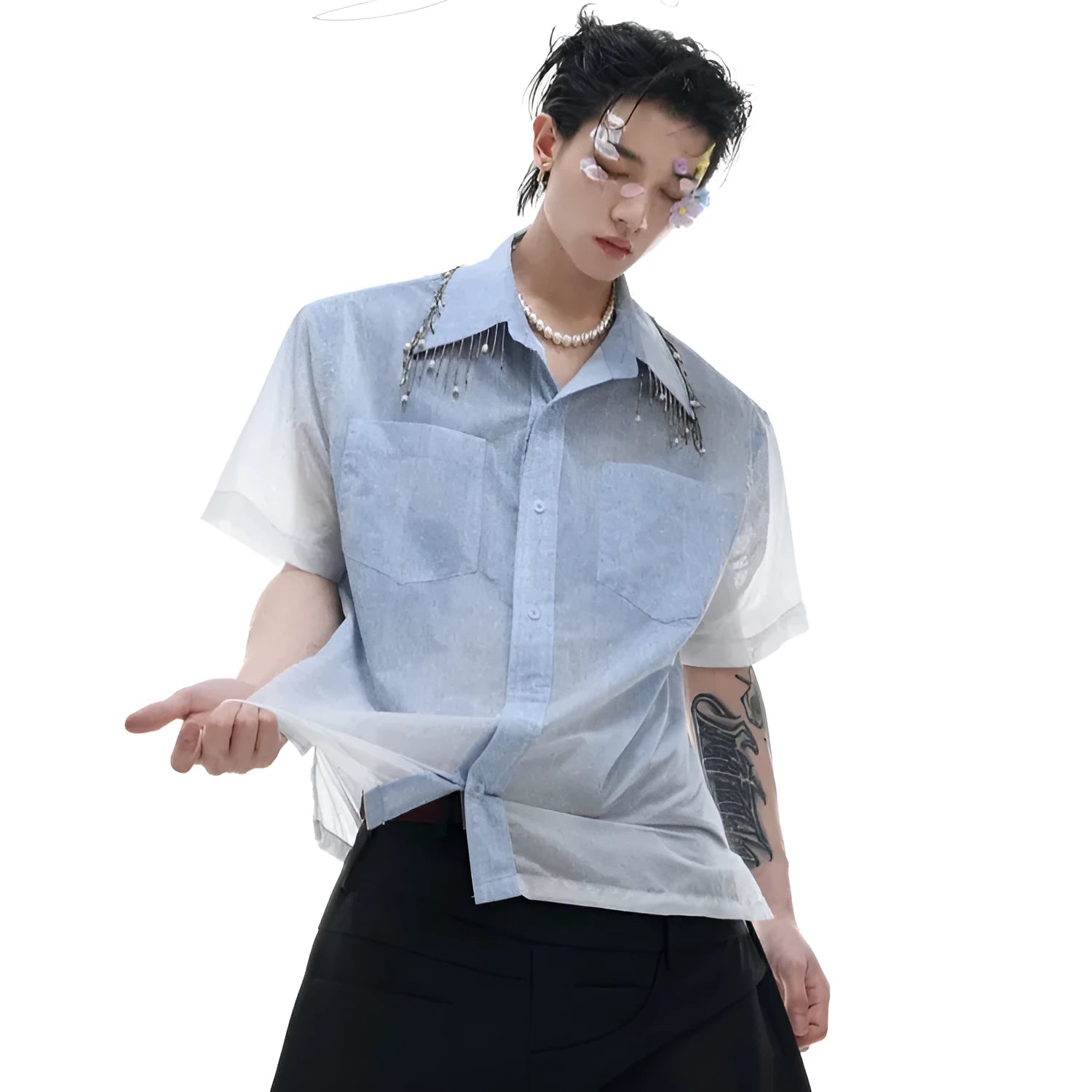 Man wearing a blue and white gradient loose fit short sleeve polyester summer shirt