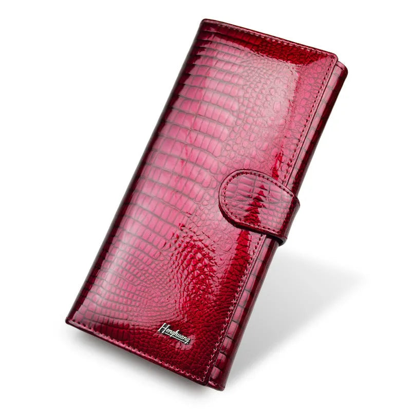 Women's patent leather coin purse with crocodile pattern in red, black, and wine red colours