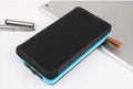 Black solar power bank with leather casing and monocrystalline solar panel showing charging ports and LED light