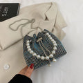 Diamond pattern women's crossbody bag in PU leather with metal chain strap, showing internal phone pocket and change purse.