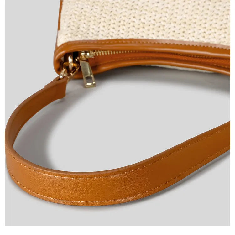 Khaki hand-woven straw selenodont crossbody bag made from PP grass with contrast colour detailing and single shoulder strap.