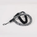High elastic retractable dog leash in black, 95 to 135cm, with neoprene foam handle and zinc alloy hardware