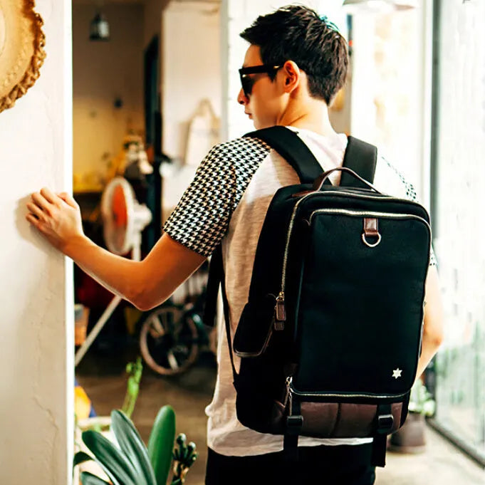 Men's modern Korean backpack in Oxford cloth showing army green colour option
