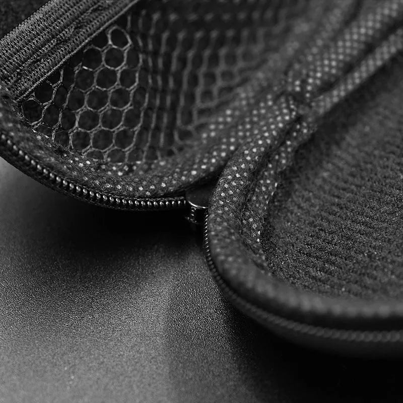 Black oval leather earphone storage bag for portable audio device protection