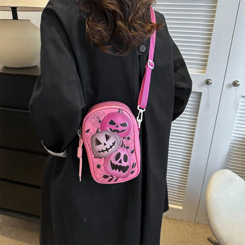 Halloween graffiti mini crossbody phone bag with cartoon pumpkin ghost bat print in black colour