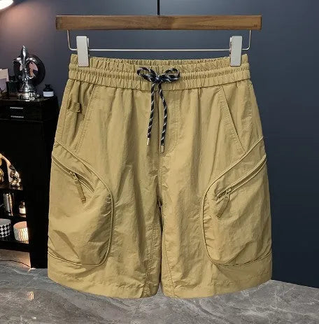 Men's camouflage cargo shorts in cotton blend fabric with loose fit and quick-drying properties