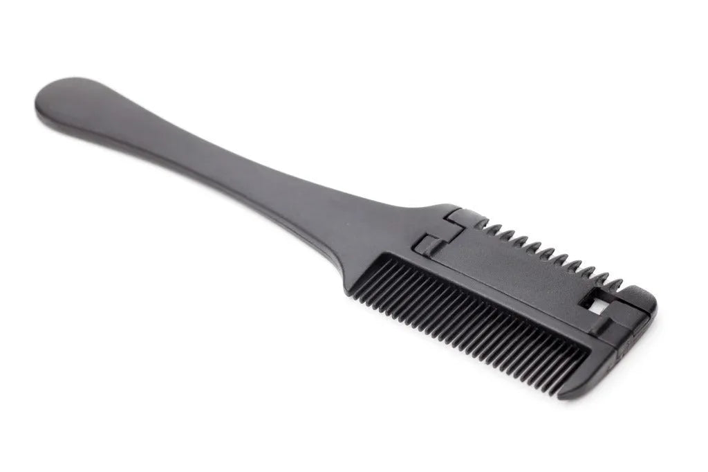 A razor comb for dog and cat grooming with a black plastic handle and metal blades, shown with spare blades.