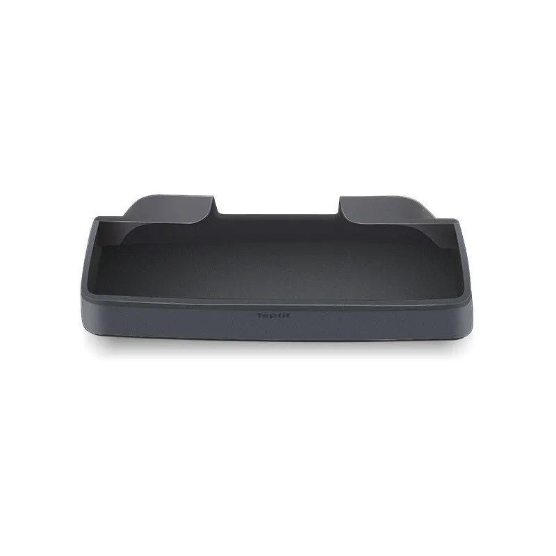 Black silicone glasses storage case installed in a Tesla Model 3 or Y centre console armrest.