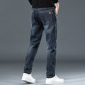 Slim straight casual trousers in blue grey colour showing mid waist design and pencil pants style