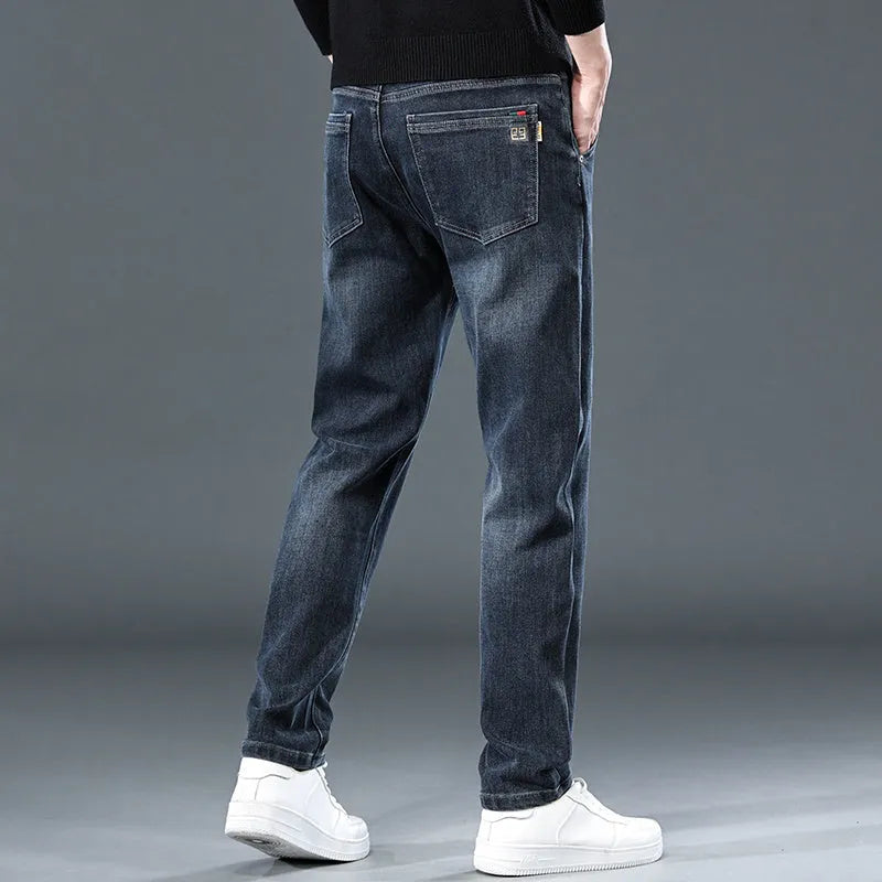 Slim straight casual trousers in blue grey colour showing mid waist design and pencil pants style