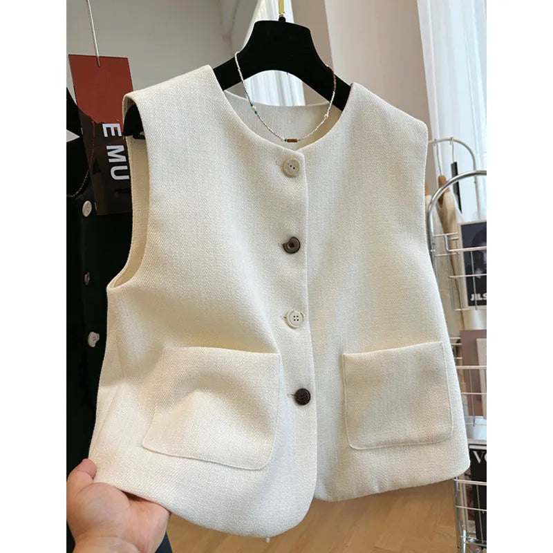 Women's round neck sleeveless vest in polyester with French bandage style, shown in milky white and black colours