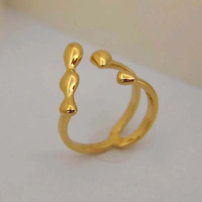 Gold or silver plated brass opening ring with circular sphere design for women