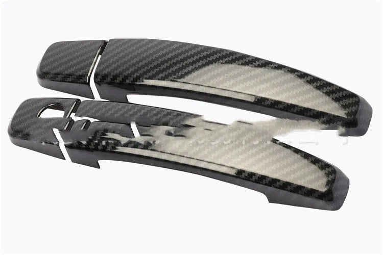 Carbon fibre pattern door handle cover for Opel Vauxhall Astra vehicles