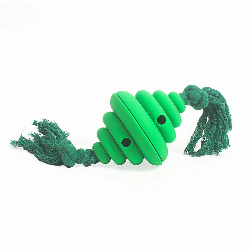 Green and yellow silicone dog ball with rope knot, showing spiral design for treat dispensing.